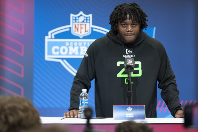 University of Missouri offensive lineman Armand Membou (OL28) answers questions at a press conference during the 2025 NFL Combine