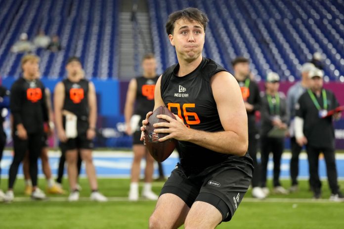 Memphis quarterback Seth Henigan (QB06) during the 2025 NFL Combine at Lucas Oil Stadium.