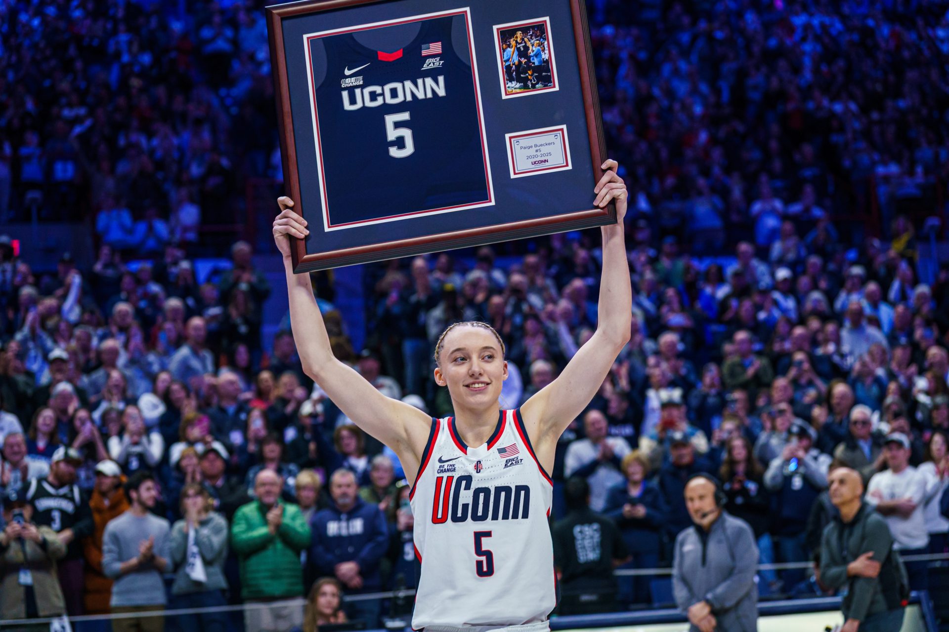 UConn Huskies guard Paige Bueckers (5) is recognized during senior night after the game against the Marquette Golden Eagles