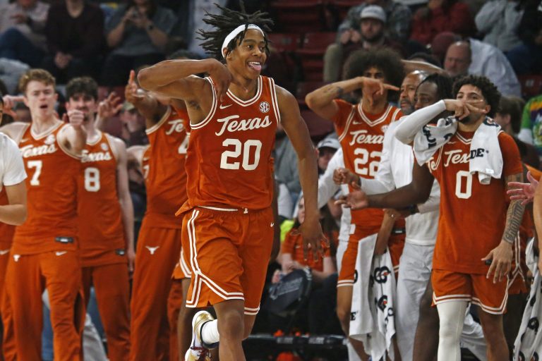 Texas Longhorns guard Tre Johnson (20) reacts after basket during the second half against the Mississippi State Bulldogs at Humphrey Coliseum.