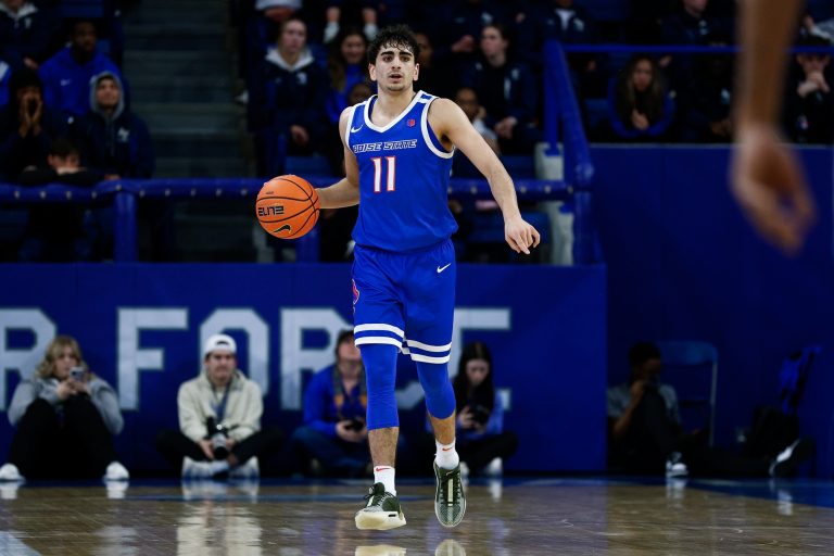 Boise State Broncos guard Alvaro Cardenas (11) dribbles the ball up court in the first half against the Air Force