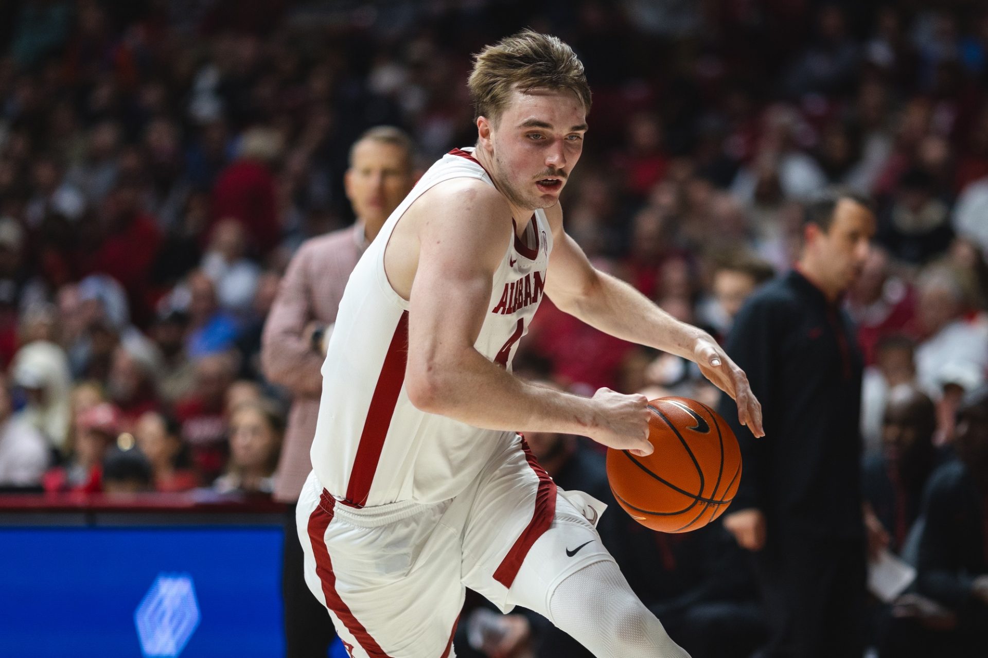 Alabama Crimson Tide forward Grant Nelson (4) drives the ball against the Florida Gators during the second half at Coleman Coliseum.