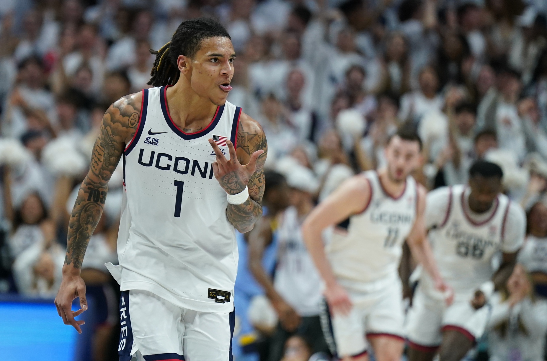 UConn Huskies guard Solo Ball (1) reacts after his three point basket against the Marquette