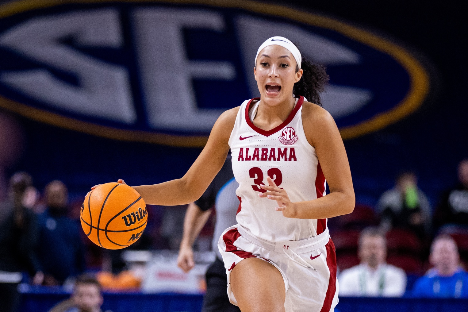 Alabama Crimson Tide guard Aaliyah Nye (32) brings the ball up court during the second half against the Florida Gators at Bon Secours Wellness Arena.