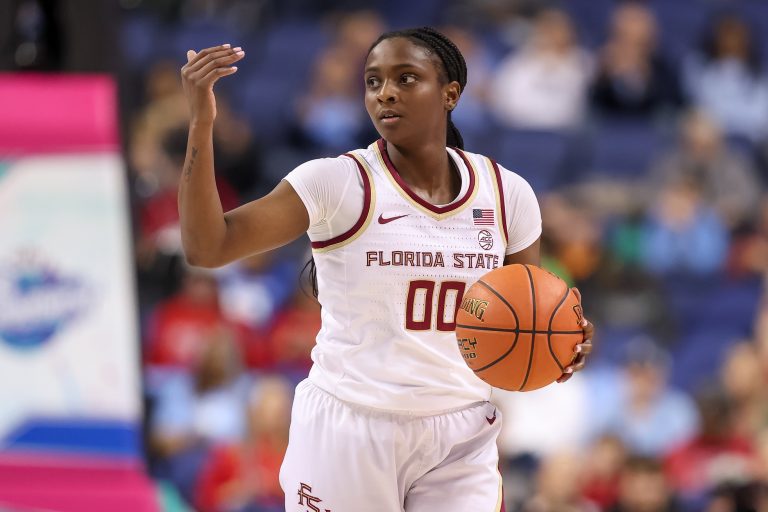 Florida State Seminoles guard Ta'Niya Latson (00) sets the play during the third quarter against North Carolina Tar Heels at First Horizon Coliseum.