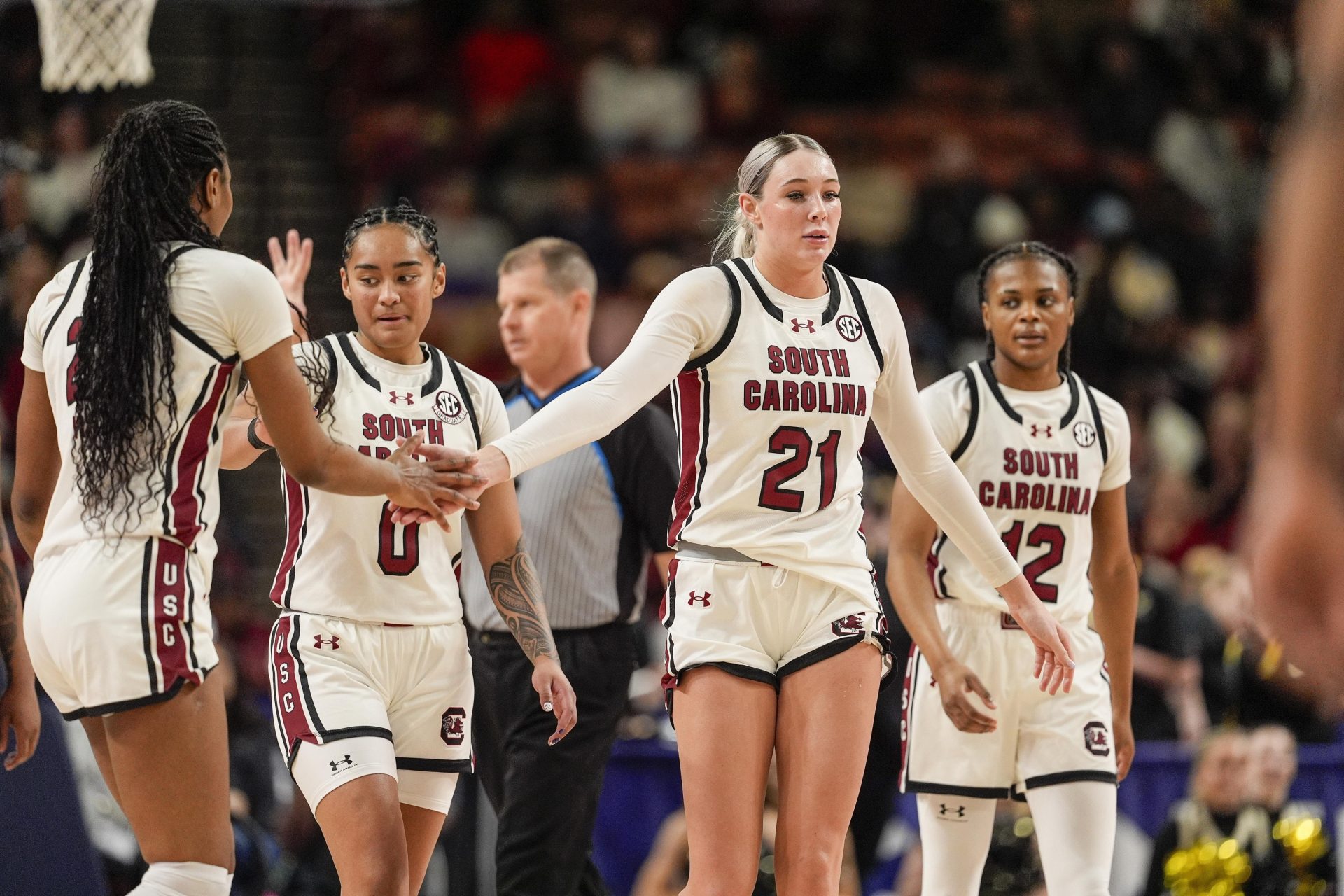 South Carolina Gamecocks forward Chloe Kitts (21) high fives a teammate after drawing a foul against the Vanderbilt Commodores