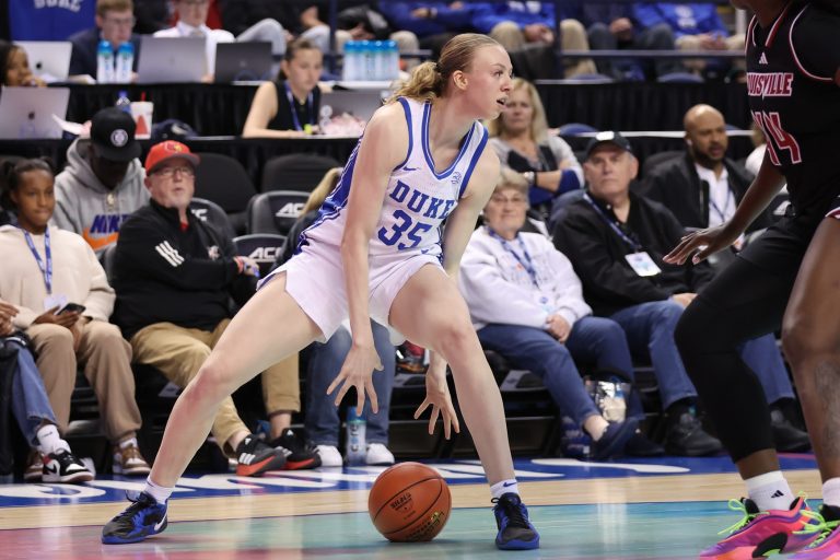 Duke Blue Devils forward Toby Fournier (35) dribbles the ball during the second quarter against Louisville Cardinals at First Horizon Coliseum.