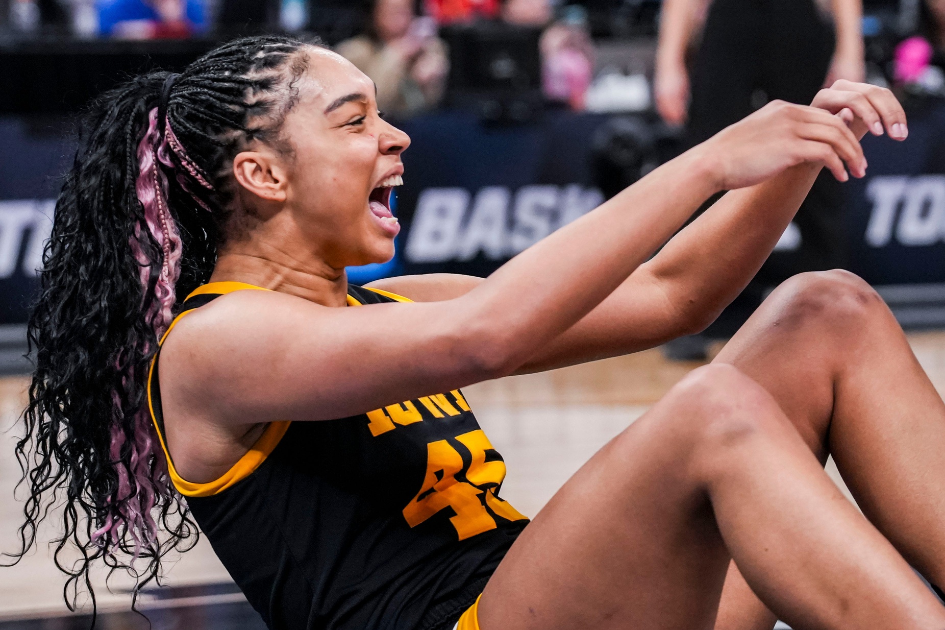 Iowa Hawkeyes forward Hannah Stuelke (45) celebrates drawing a foul Friday, March 7, 2025, in a quarterfinals game at the 2025 TIAA Big Ten Women's Basketball Tournament between the Iowa Hawkeyes and the Ohio State Buckeyes at Gainbridge Fieldhouse in Indianapolis. The Buckeyes defeated the Hawkeyes, 60-59.