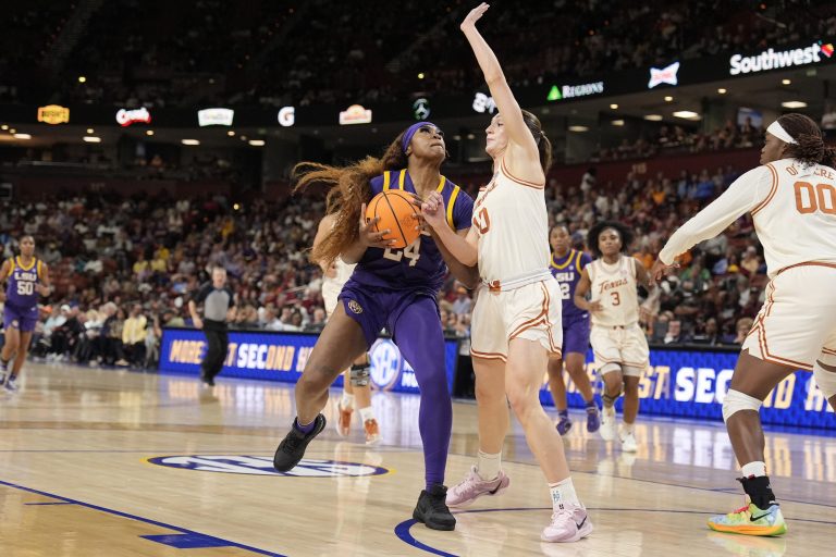 LSU Lady Tigers guard Aneesah Morrow (24) drives to the basket against Texas Longhorns guard Shay Holle (10) during the first half at Bon Secours Wellness Arena.
