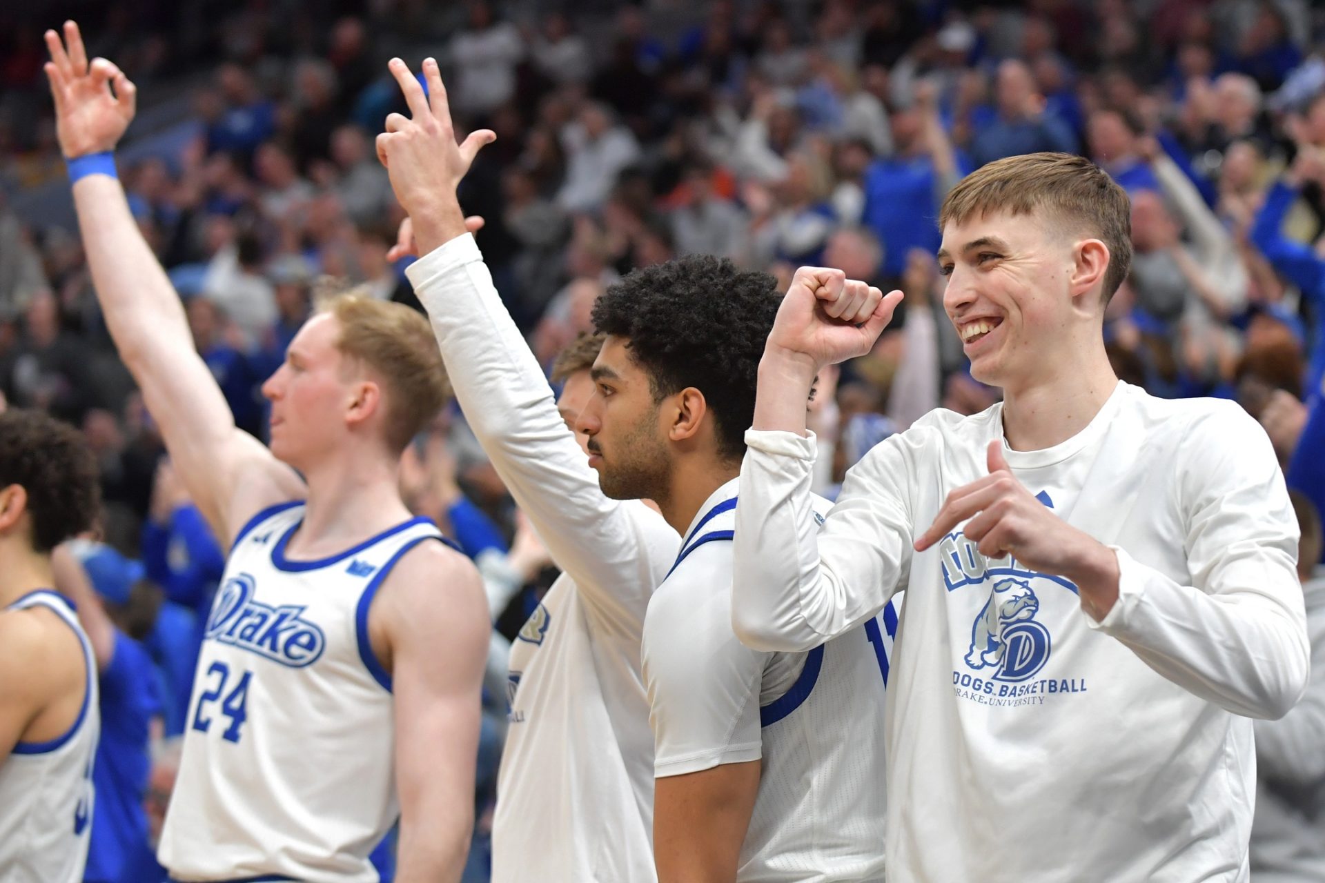 The Drake Bulldog bench reactors after a score during the second half against the Belmont Bulldogs