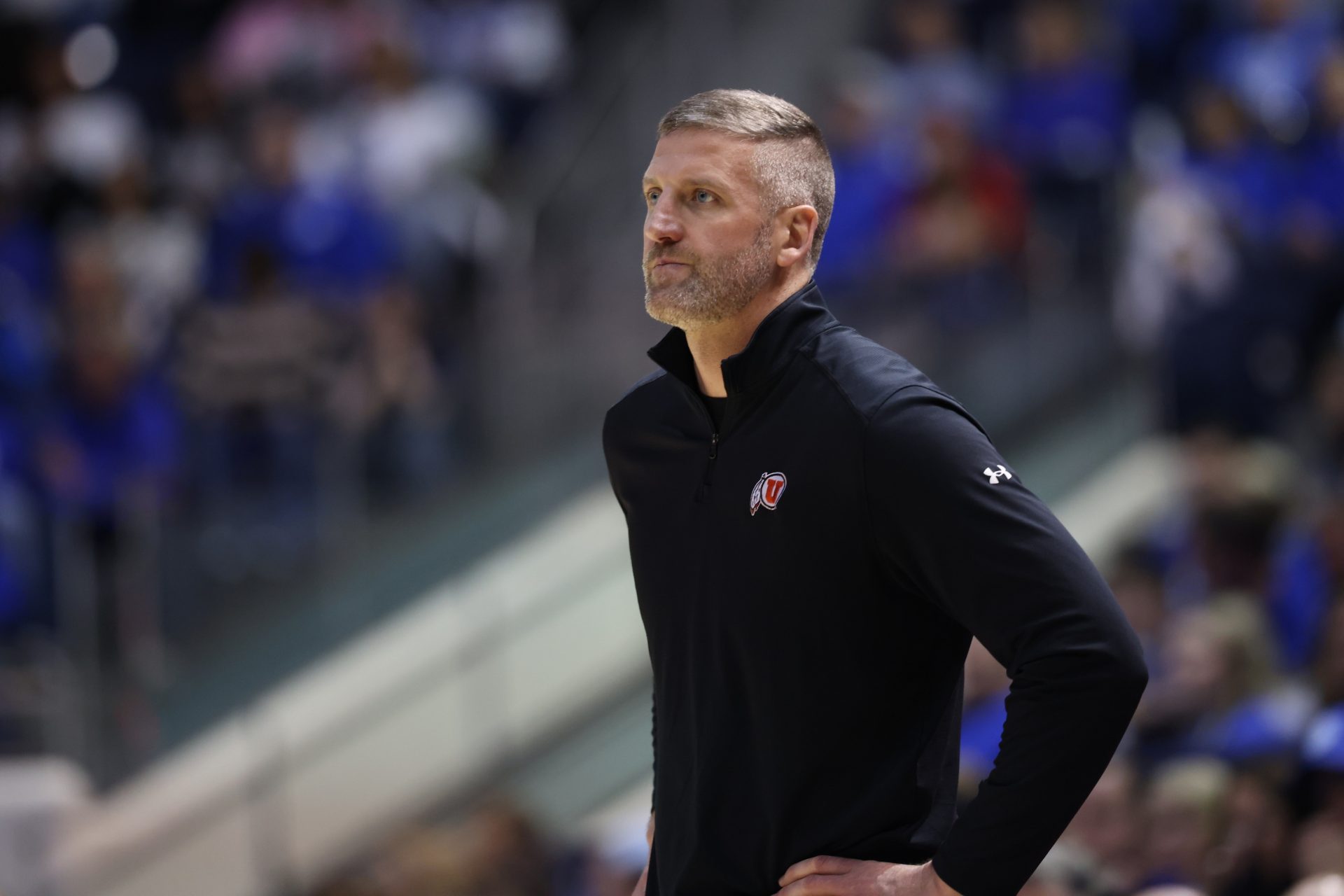 Utah Utes interim head coach Josh Eilert looks on during the first half against the Brigham Young Cougars at Marriott Center.