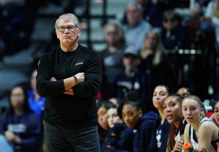UConn Huskies head coach Geno Auriemma watches from the sideline as they take on the Villanova Wildcats at Mohegan Sun Arena.