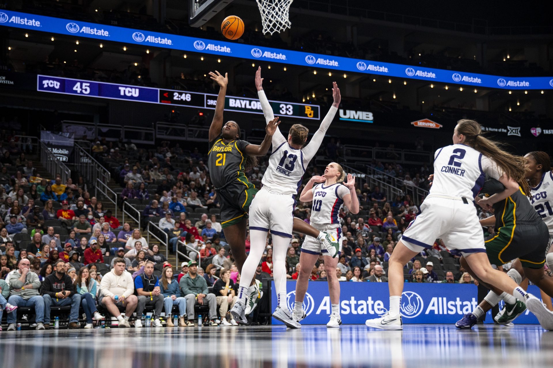 Baylor Lady Bears center Aaronette Vonleh (21) shoots the ball while defended by TCU Horned Frogs center Sedona Prince (13) during the second half at T-Mobile Center.