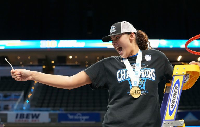 UCLA Bruins center Lauren Betts (51) reacts after cutting the net after her team defeated the USC Trojans during the 2025 TIAA Big Ten Women's Basketball Tournament final game on Sunday, March 9, 2025, at Gainbridge Fieldhouse in Indianapolis. UCLA defeated USC 72-67.