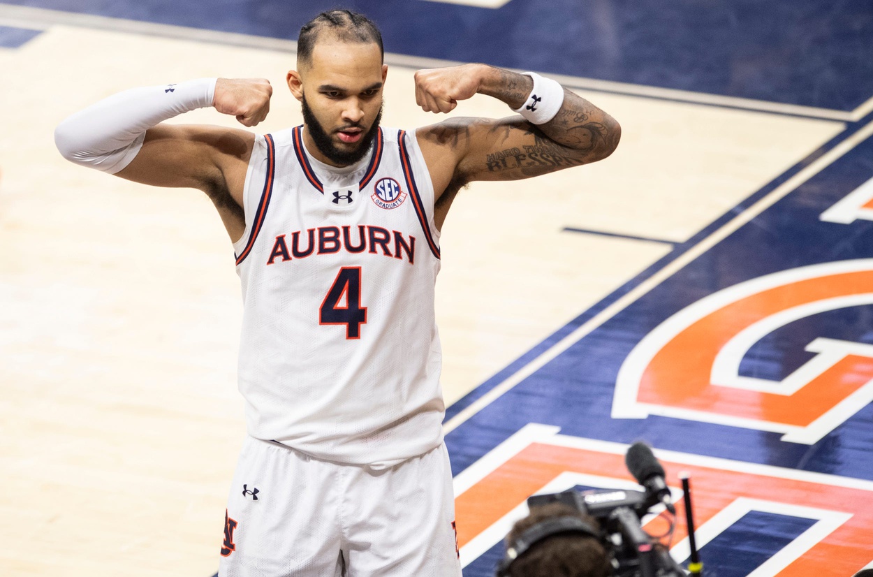 Auburn Tigers forward Johni Broome (4) celebrates an and-one play as Auburn Tigers take on Missouri Tigers at Neville Arena in Auburn, Ala., on Saturday, Jan. 4, 2025. Auburn Tigers defeated Missouri Tigers 84-68.