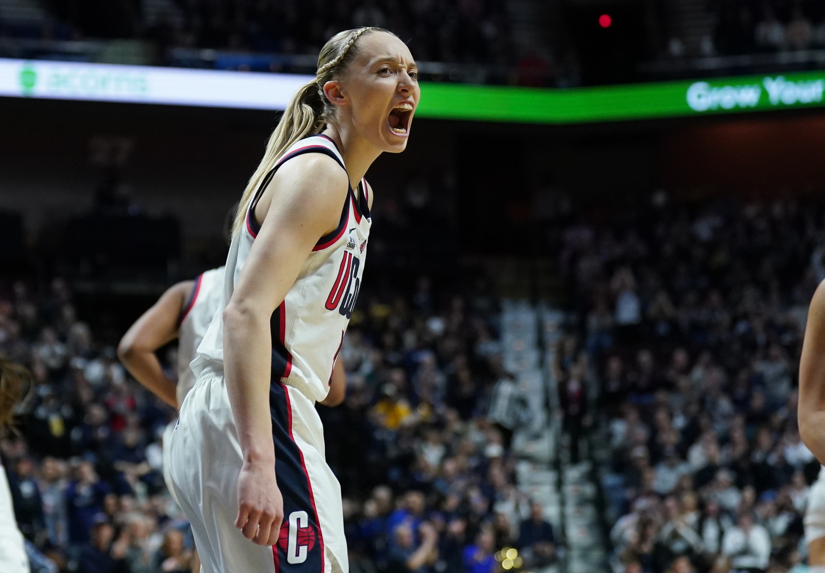 UConn Huskies guard Paige Bueckers (5) reacts after a play against the Creighton Bluejays in the first half at Mohegan Sun Arena.