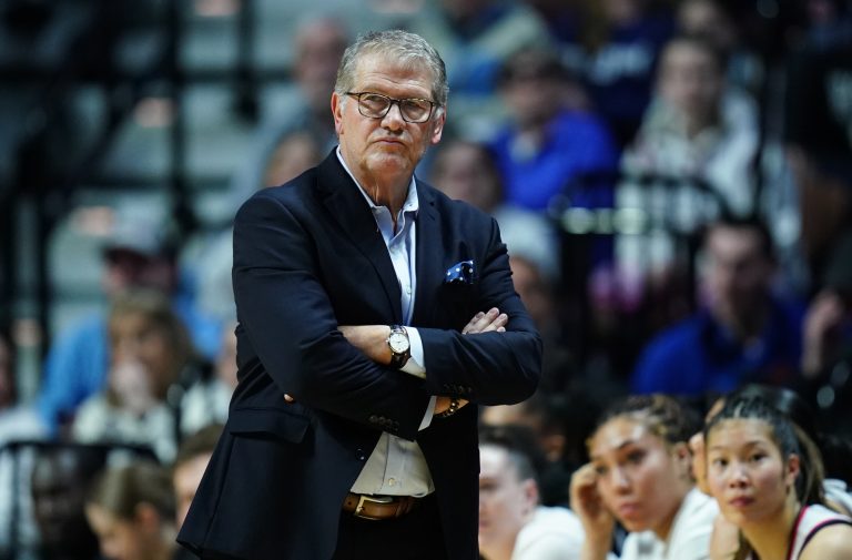 UConn Huskies head coach Geno Auriemma watches from the sideline as they take on the Creighton Bluejays at Mohegan Sun Arena.