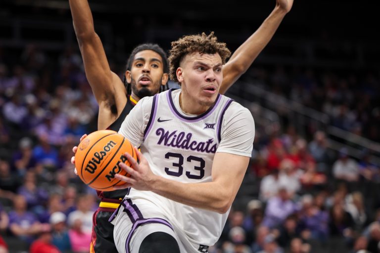 Kansas State Wildcats guard Coleman Hawkins (33) drives to the basket during the first half against the Arizona State Sun Devils at T-Mobile Center.