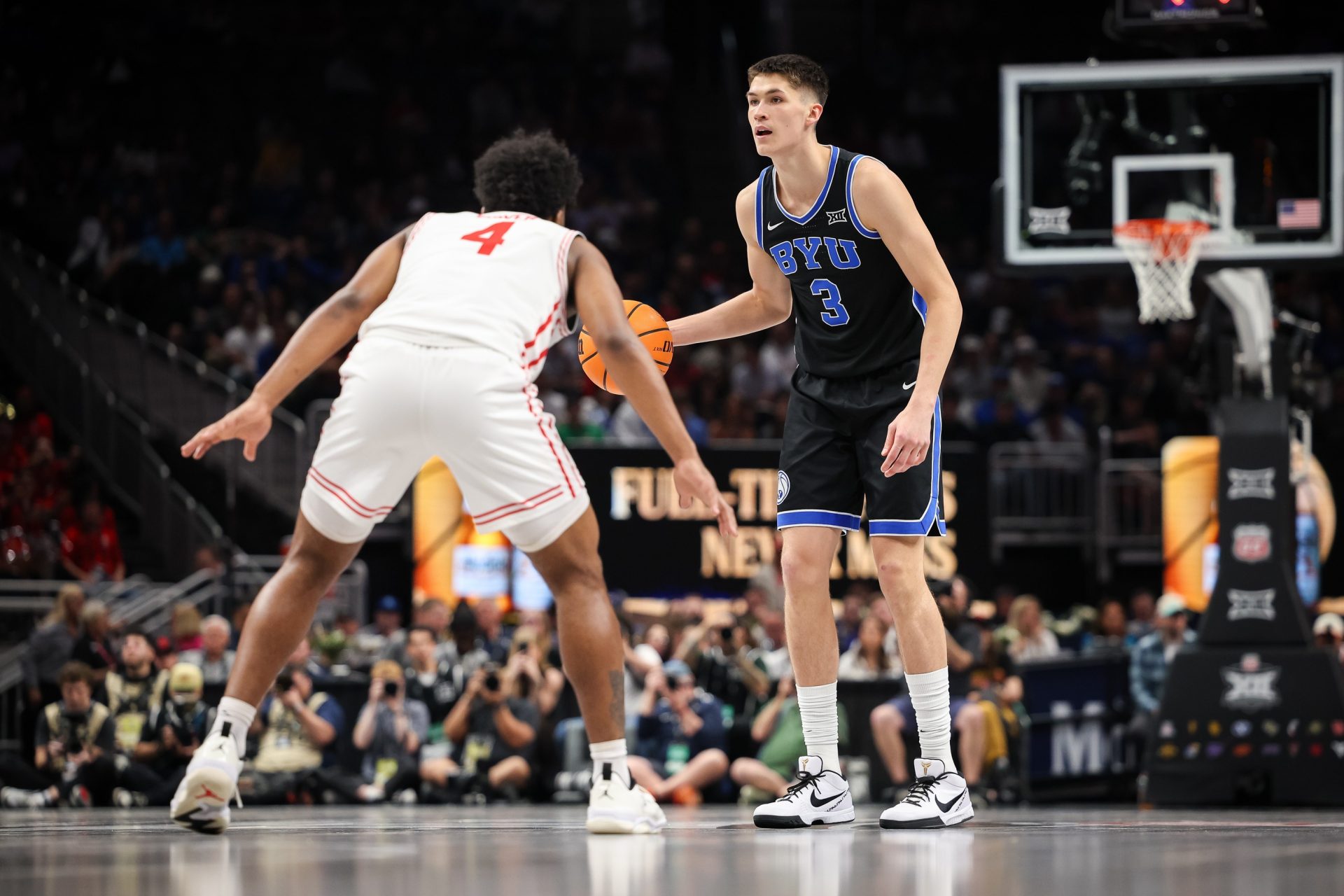 Brigham Young Cougars guard Egor Demin (3) dribbles against Houston Cougars guard L.J. Cryer (4) during the second half at T-Mobile Center.