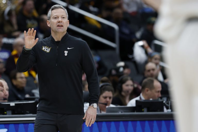 VCU Rams head coach Ryan Odom gestures from the sideline against the Loyola Chicago Ramblers in the first half at Capital One Arena.