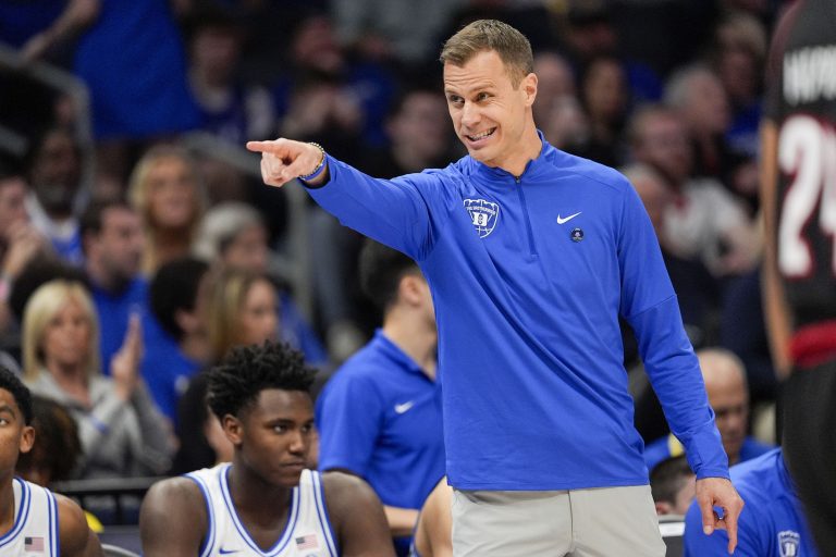 Duke Blue Devils head coach Jon Scheyer signals to his team during the 2025 ACC Conference Championship game at Spectrum Center.