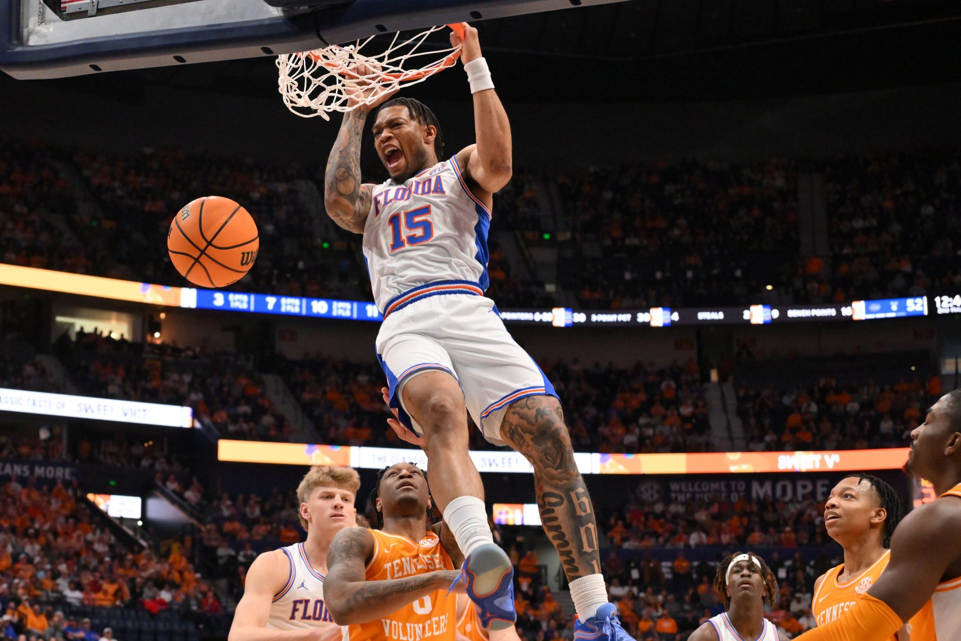 Florida Gators guard Alijah Martin (15) reacts after a dunk against the Tennessee Volunteers in the second half during the 2025 SEC Championship Game at Bridgestone Arena.