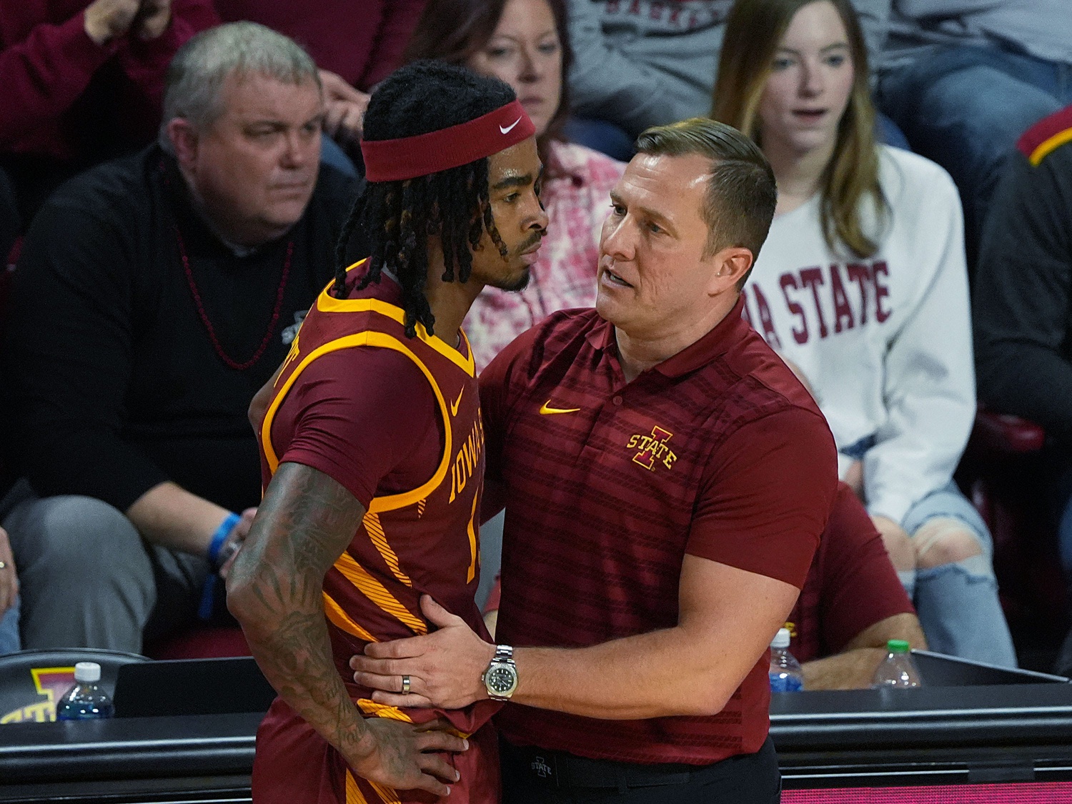 T.J. Otzelberger talks to Keshon Gilbert (10) at Hilton Coliseum on Feb. 15, 2025 in Ames, Iowa.