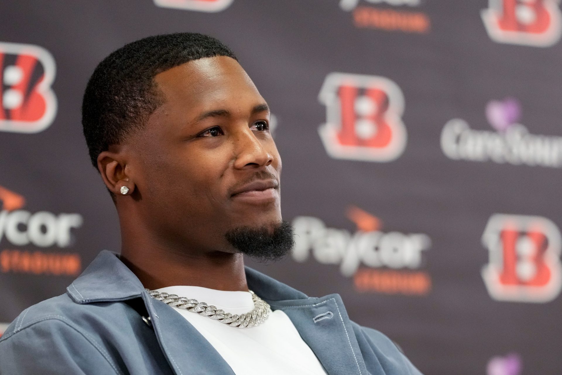 Cincinnati Bengals receiver Tee Higgins smiles during a press conference to announce the signing of new contracts for receivers Ja’Marr Chase and Tee Higgins at Paycor Stadium in downtown Cincinnati on Tuesday, March 18, 2025. Chase becomes the new highest-paid non-quarterback player in the NFL.