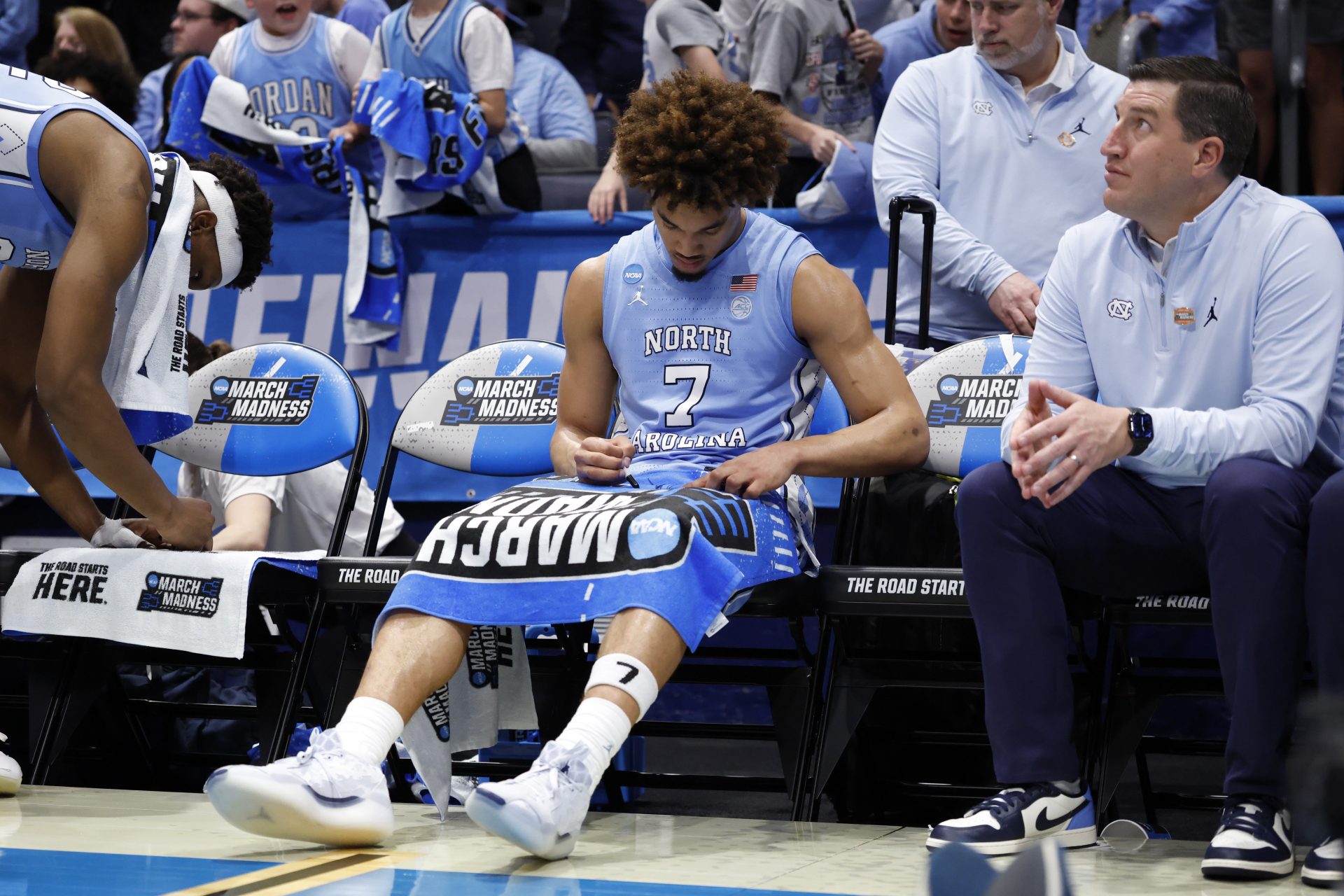 North Carolina Tar Heels guard Seth Trimble (7) signs a “March Madness” towel in the second half against the San Diego State Aztecs at UD Arena.