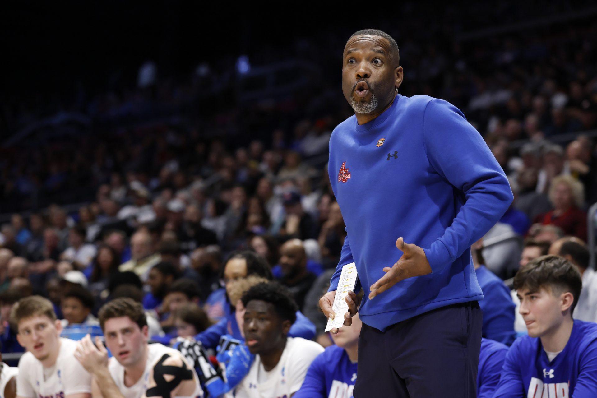 American University Eagles head coach Duane Simpkins reacts in the first half against the Mount St. Mary's Mountaineers at UD Arena.