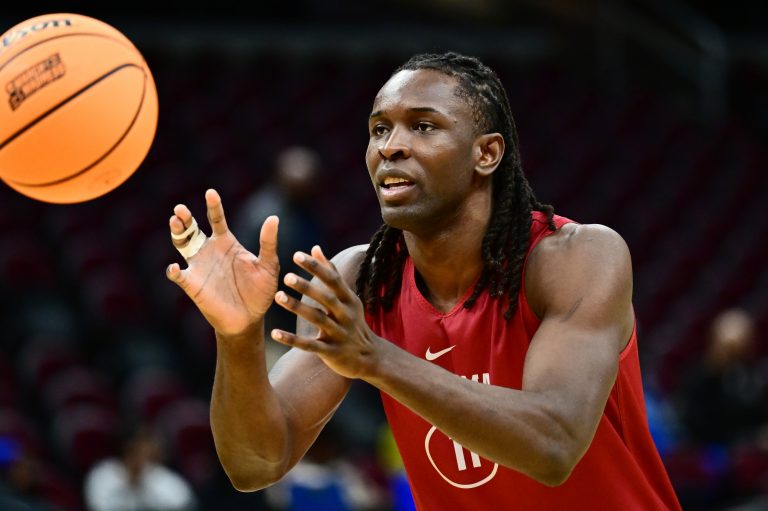 Alabama Crimson Tide center Clifford Omoruyi (11) catches a pass during practice at Rocket Arena.