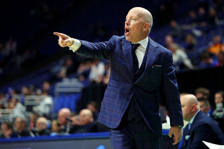 UCLA Bruins head coach Mick Cornin calls to his team during the second half against the Utah State Aggies in the first round of the NCAA Tournament at Rupp Arena.