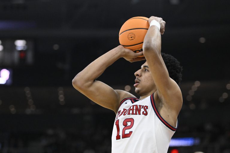 St. John's Red Storm guard RJ Luis Jr. (12) puts up a shot during the second half against the Omaha Mavericks at Amica Mutual Pavilion.