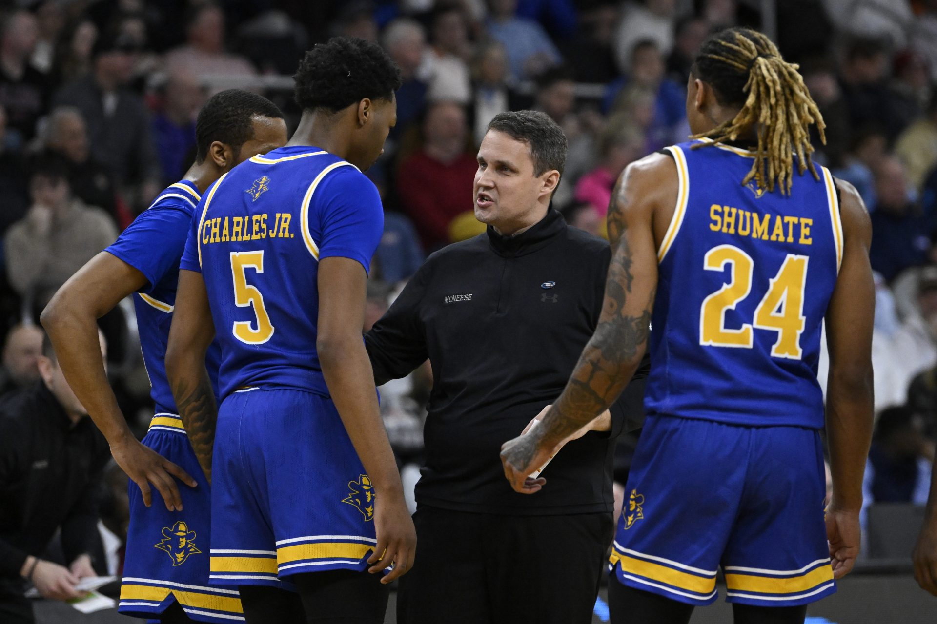 McNeese State Cowboys head coach Will Wade talks with his players during the first half against the Clemson Tigers at Amica Mutual Pavilion.