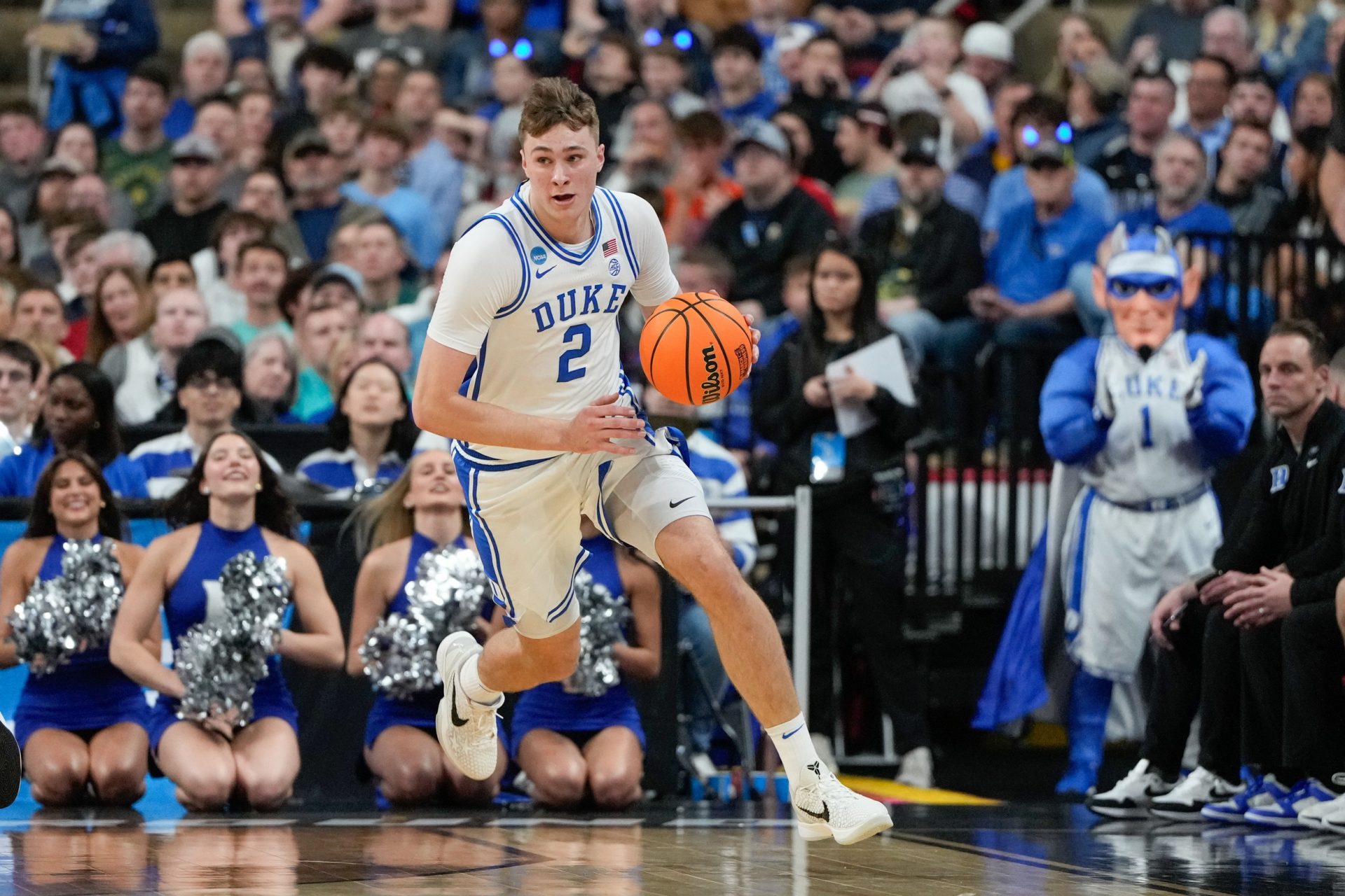 Duke Blue Devils forward Cooper Flagg (2) dribbles the ball against the Mount St. Mary's Mountaineers during the first half in the first round of the NCAA Tournament at Lenovo Center.