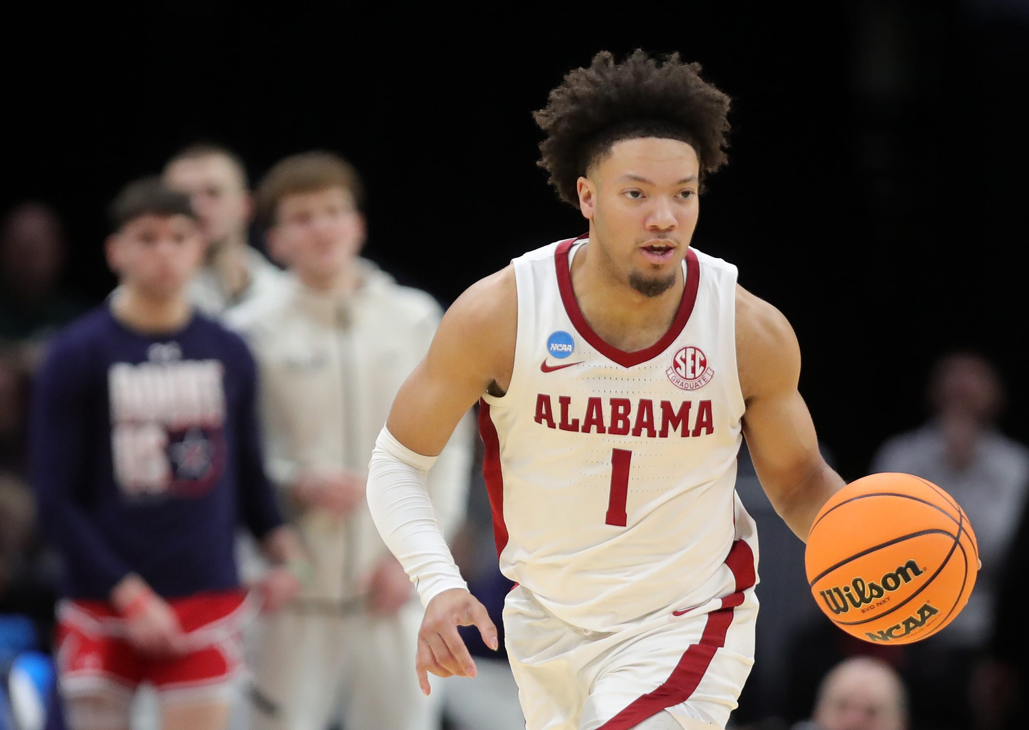 Alabama Crimson Tide guard Mark Sears (1) takes the ball up the court during the second half of an NCAA Tournament First Round game against the Robert Morris Colonials at Rocket Arena