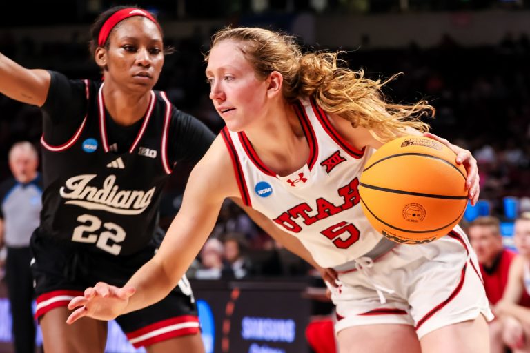 Utah Utes guard Gianna Kneepkens (5) drives past Indiana Hoosiers guard Chloe Moore-McNeil (22) in the second half at Colonial Life Arena.