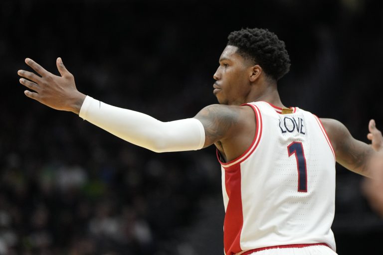 Arizona Wildcats guard Caleb Love (1) reacts against the Akron Zips during the second half in the first round of the NCAA Tournament at Climate Pledge Arena.