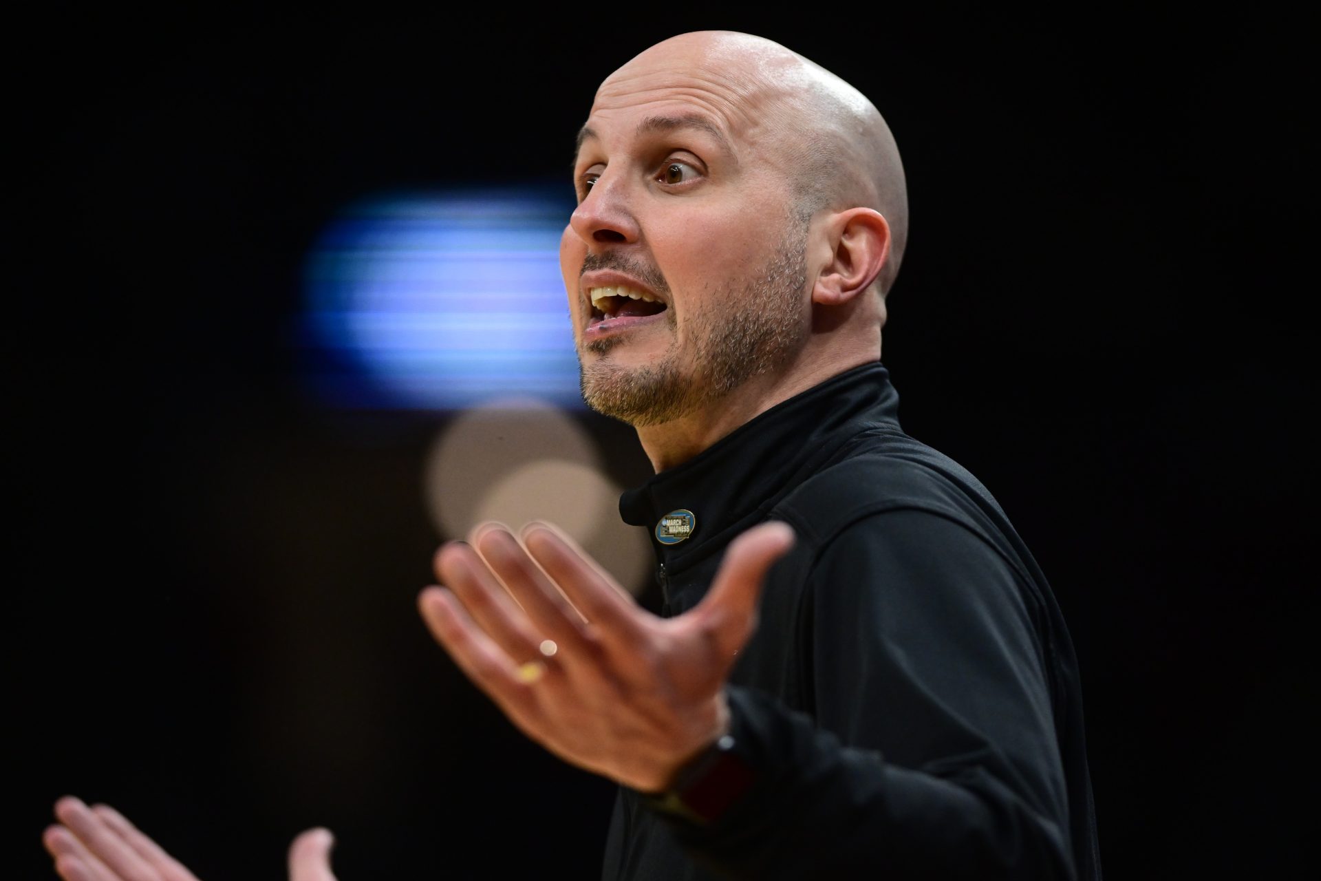 Bryant University Bulldogs head coach Phil Martelli Jr reacts in the first half against the Michigan State Spartans during the NCAA Tournament First