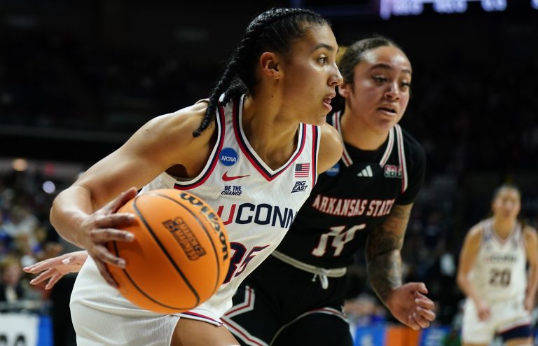 UConn Huskies guard Azzi Fudd (35) drives the ball against Arkansas State Red Wolves guard Anna Griffin (14) in the first half at Harry A. Gampel Pavilion.