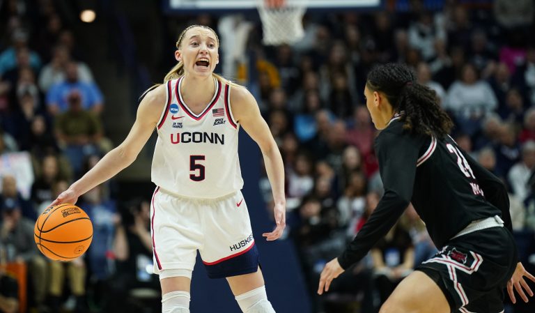 UConn Huskies guard Paige Bueckers (5) looks for an opening against the Arkansas State Red Wolves in the first half at Harry A. Gampel Pavilion.