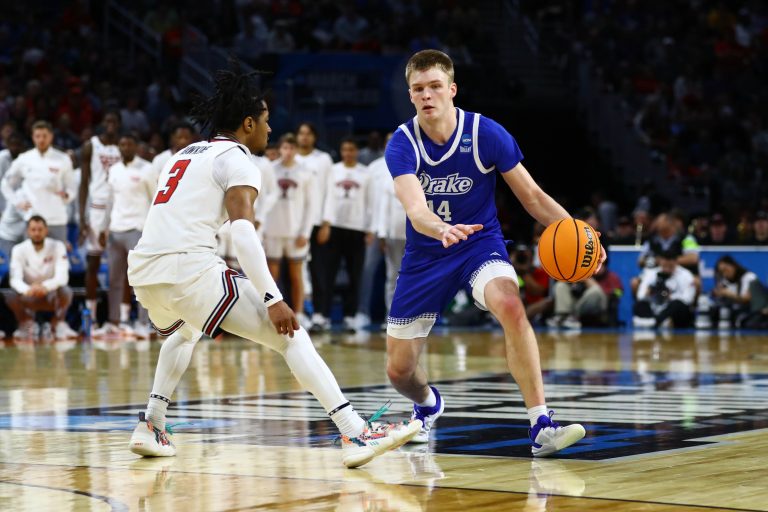 Drake Bulldogs guard Bennett Stirtz (14) dribbles the ball against Texas Tech Red Raiders guard Elijah Hawkins (3) during the second half at Intrust Bank Arena.