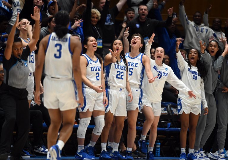The Duke Blue Devils bench reacts to a three-pointer by Ashlon Jackson (3) during the second half against the Oregon Ducks at Cameron Indoor Stadium. The Blue Devils won 59-53.