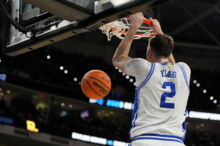 Duke Blue Devils forward Cooper Flagg (2) dunks the ball during the first half against the Baylor Bears in the second round of the NCAA Tournament at Lenovo Center.