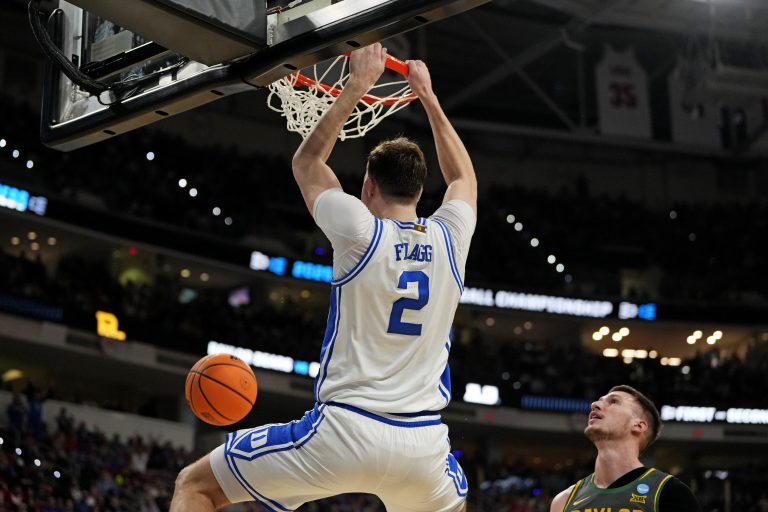 Duke Blue Devils forward Cooper Flagg (2) dunks the ball during the first half against the Baylor Bears in the second round of the NCAA Tournament at Lenovo Center.
