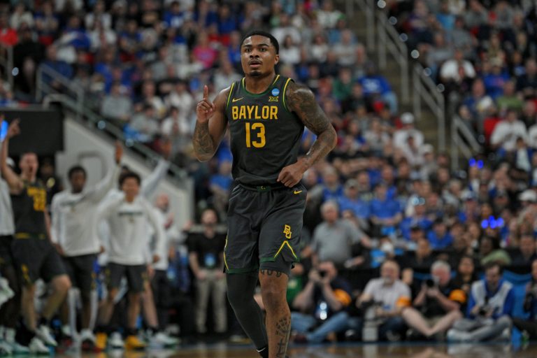 Baylor Bears guard Langston Love (13) reacts during the first half against the Duke Blue Devils in the second round of the NCAA Tournament