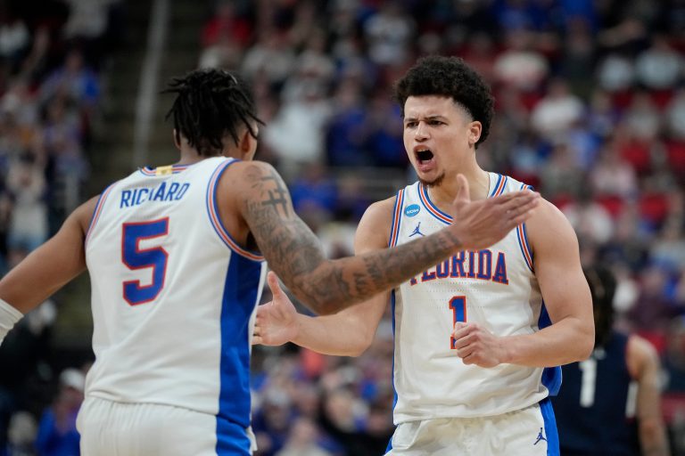 Florida guard Walter Clayton Jr. (1) reacts with guard Will Richard (5) in the second half at Lenovo Center.