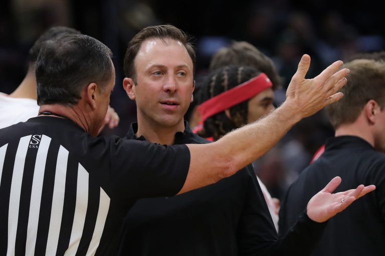 New Mexico Lobos head coach Richard Pitino speaks with an official during the second half of an NCAA Tournament Second Round game at Rocket Arena on Sunday, March 23, 2025, in Cleveland, Ohio.