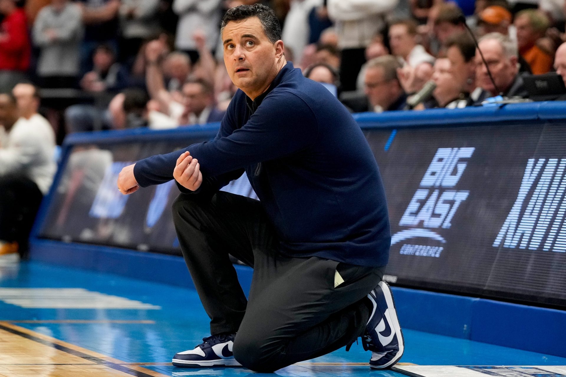 Xavier Musketeers head coach Sean Miller looks to the video board in the second half of the NCAA Tournament First Four