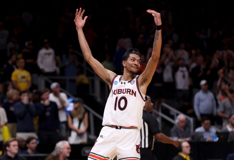Auburn Tigers guard Chad Baker-Mazara (10) celebrates after a play in the second half of a South Regional semifinal of the 2025 NCAA tournament against the Michigan Wolverines at State Farm Arena.